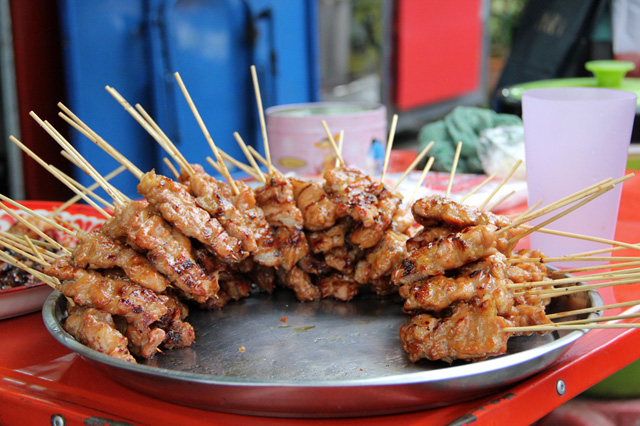 Platter of Thai Style Grilled Pork Sticks (Moo Ping)