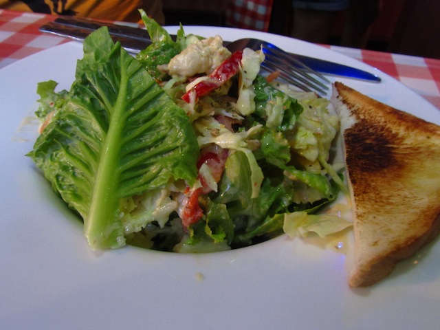 Chicken salad covered in Chef Odd signature house dressing