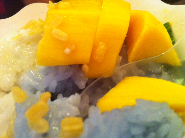 Nap time after a couple of plates of mango and blue sticky rice!